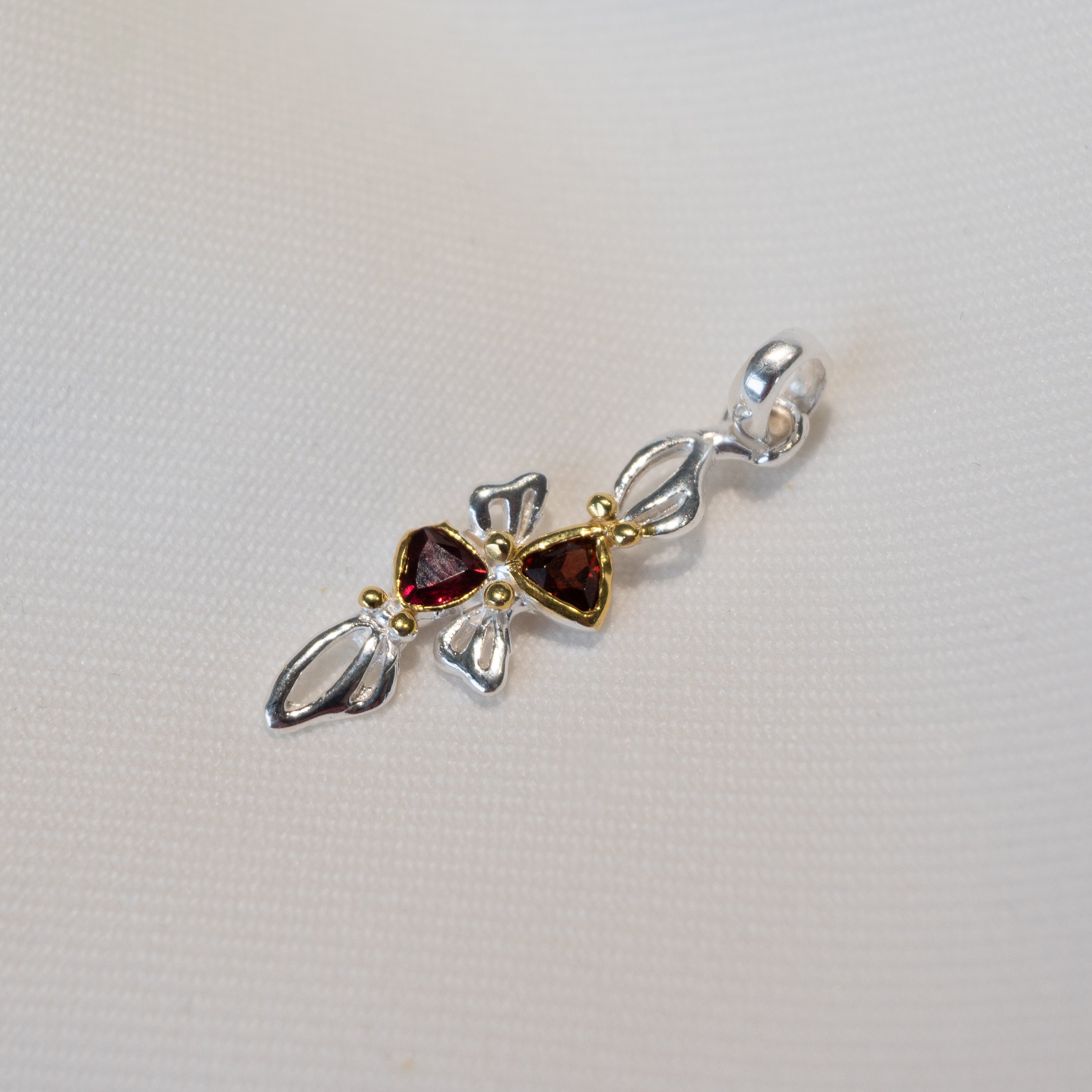 Out Designs, Garnet Bow Pendant