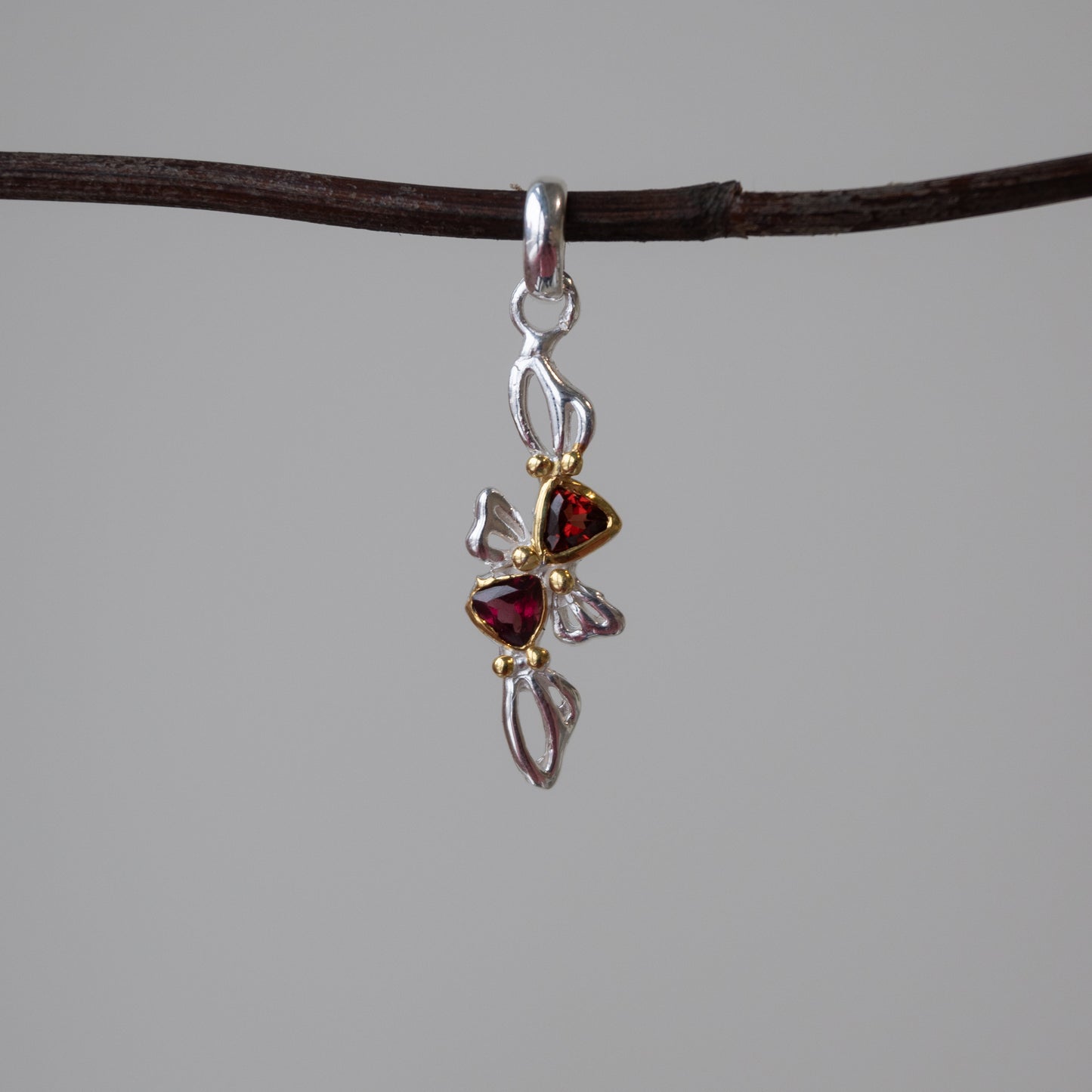 Out Designs, Garnet Bow Pendant