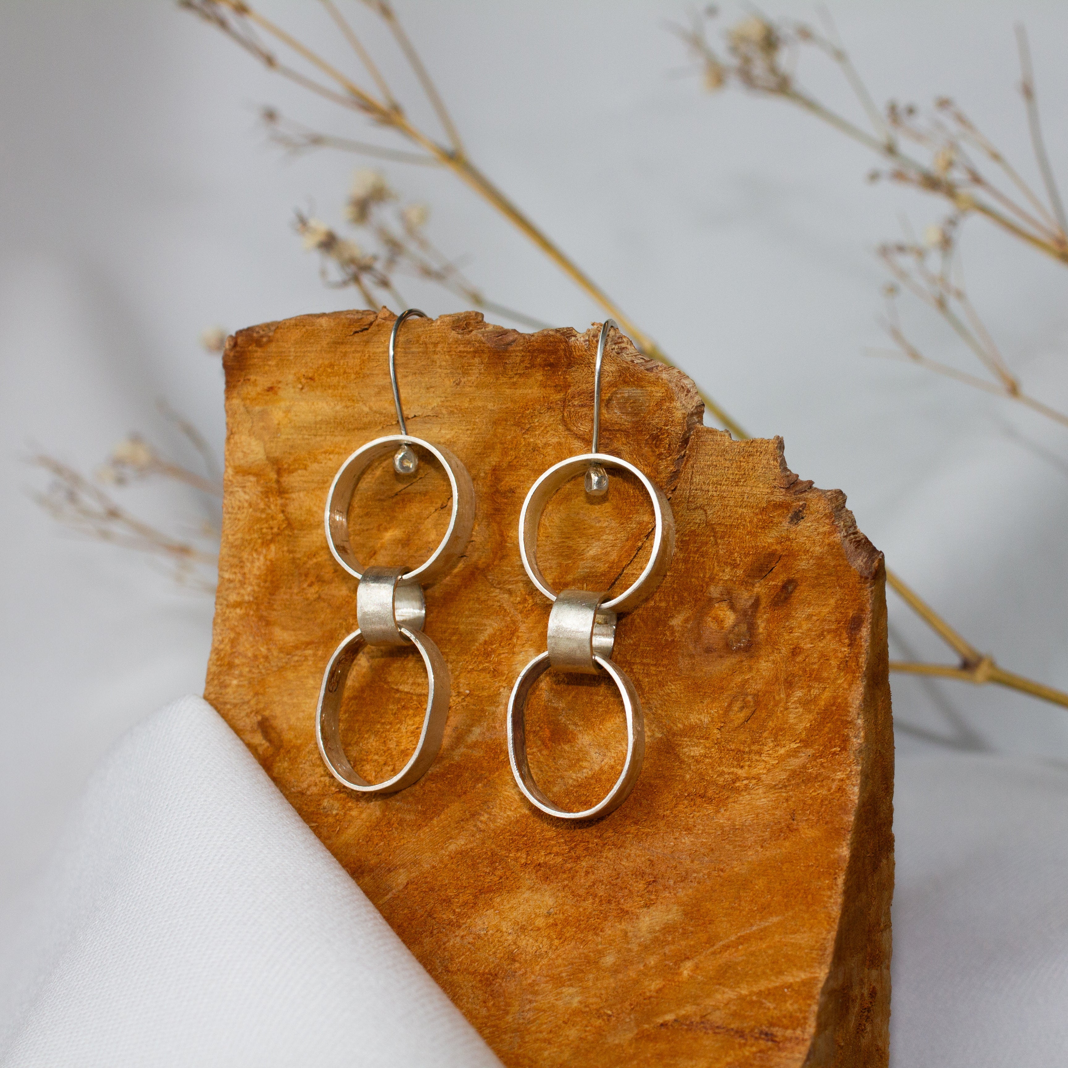 Galili Ellis, Linked Silver Closed Shape Dangle Earrings